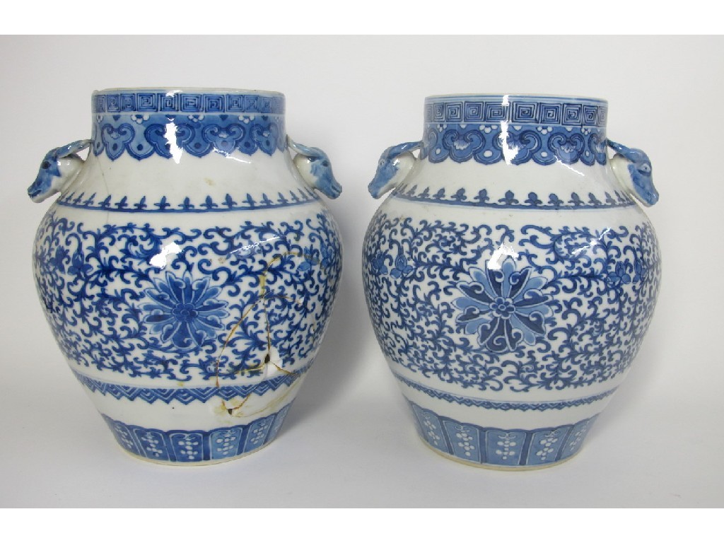 Appraisal: Two similar Chinese blue and white two handled baluster vases