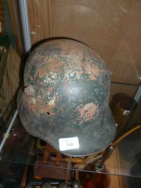 Appraisal: A GERMAN MILITARY NAZI HELMET with eagle skull and crossbones