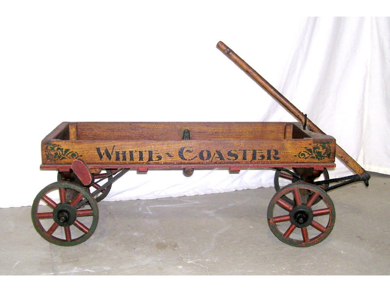 Appraisal: White Co Wooden Wagon Low sided wooden wagon with original