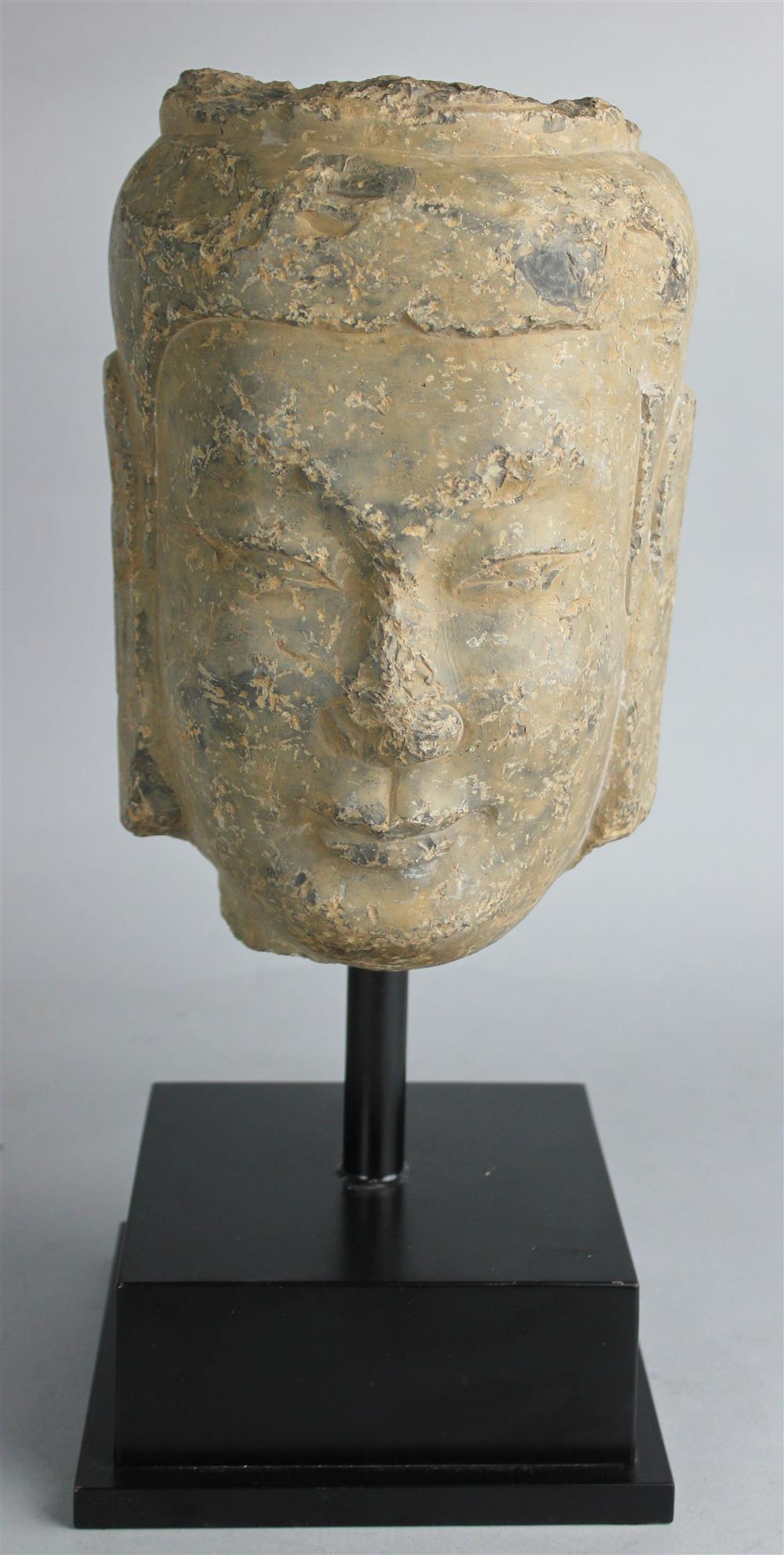 Appraisal: STONE HEAD OF THE BUDDHA NORTHERN WEI DYNASTY carved with