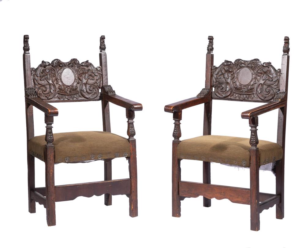 Appraisal: Pair of Italian Carved Walnut Hall Chairs th c scrolled