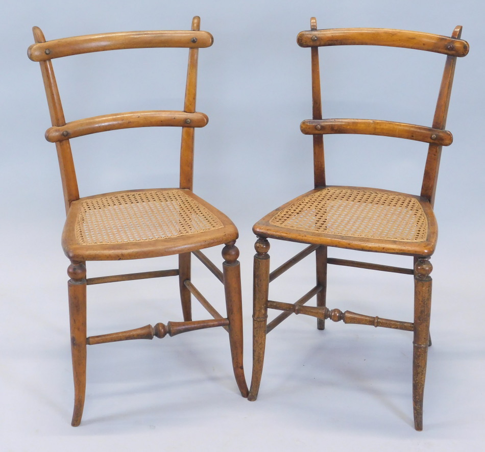 Appraisal: Two similar Victorian bedroom chairs each with a caned seat