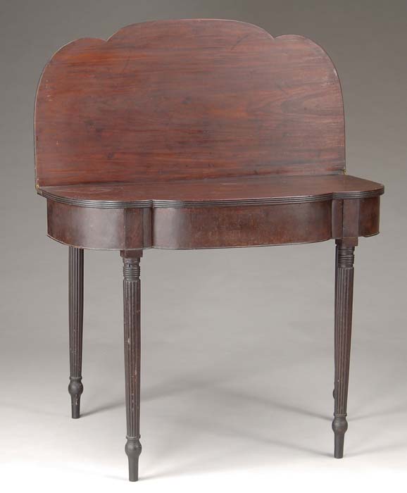 Appraisal: MAHOGANY SHERATON CARD TABLE Shaped fold over top with conforming