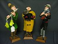 Appraisal: SET OF THREE CAROLERS This set has three men singing