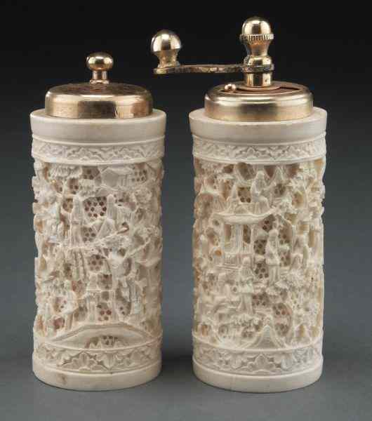 Appraisal: Pr Carved ivory salt and pepper shakers International buyers should