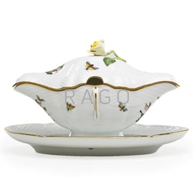 Appraisal: HEREND Gravy boat and underplate in the Rothschild Bird pattern