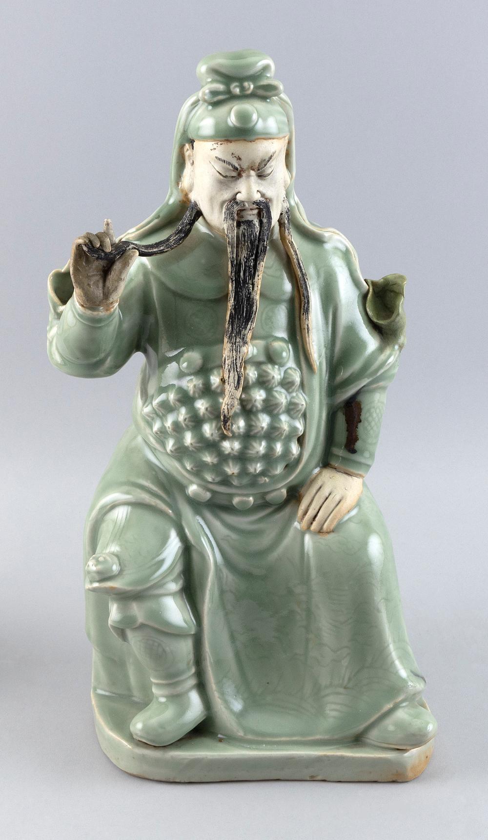 Appraisal: CHINESE CELADON GLAZE PORCELAIN FIGURE OF GUANDI POSSIBLY KANGXI PERIOD