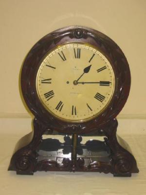 Appraisal: A VICTORIAN MANTEL CLOCK the eight day drop dial twin