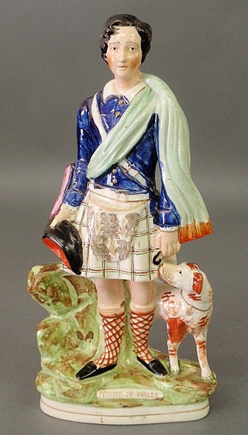 Appraisal: Colorful Staffordshire figural group of the Prince of Wales and