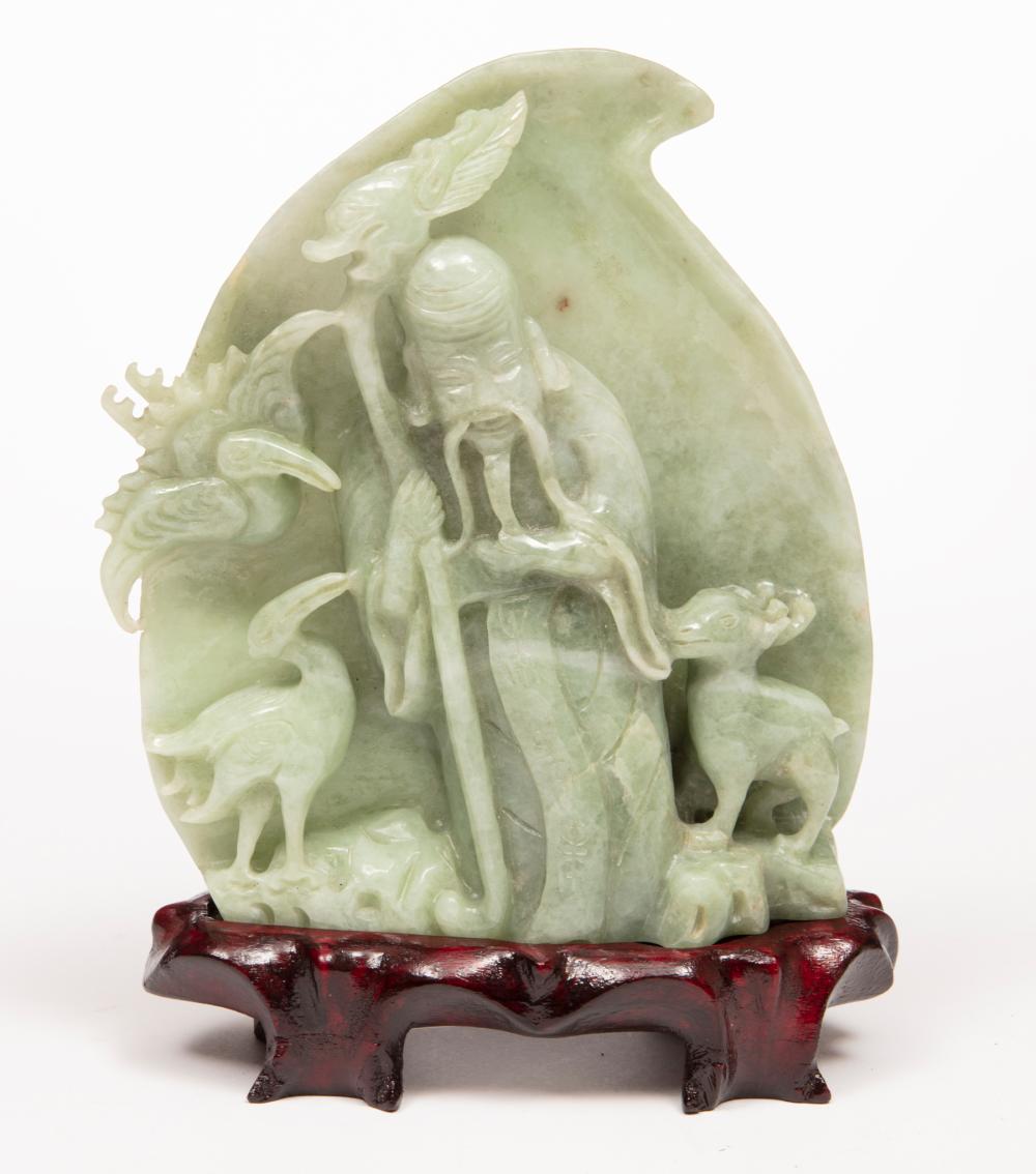 Appraisal: Chinese Celadon Jade Figural Group carved as Shoulao flanked by