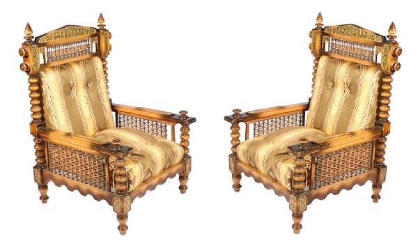 Appraisal: A pair of Moorish style inlaid and upholstered armchairs height