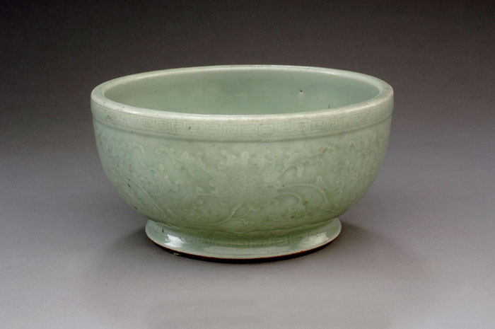 Appraisal: CHINESE CELADON-GLAZED BOWL The interior molded with a lotus flower