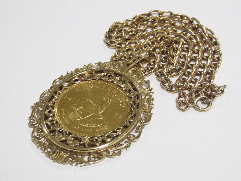 Appraisal: A fine gold Kruggerand dated with ct gold scroll decorated