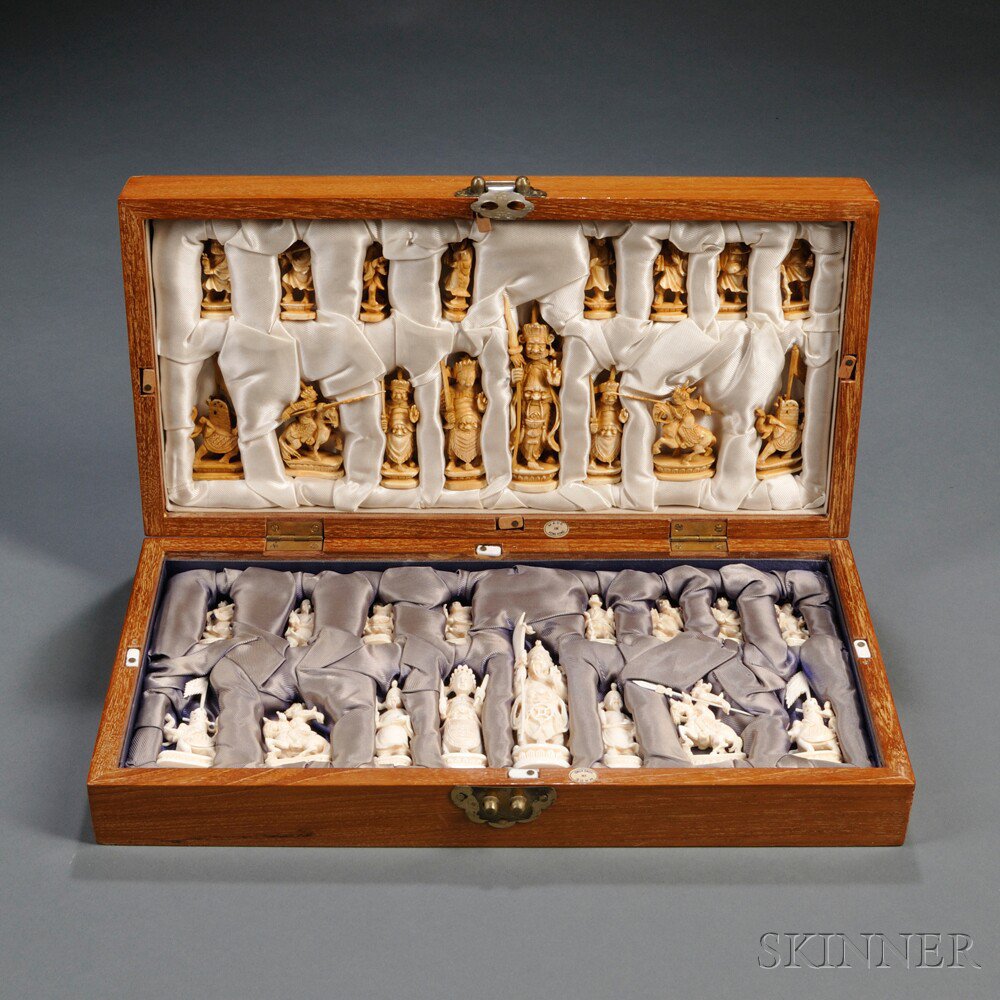 Appraisal: Set of Carved Ivory Chess Pieces China in a wooden