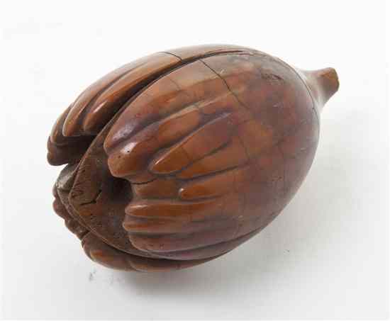 Appraisal: A Chinese Carved Boxwood Flower Bud having articulated petals carved