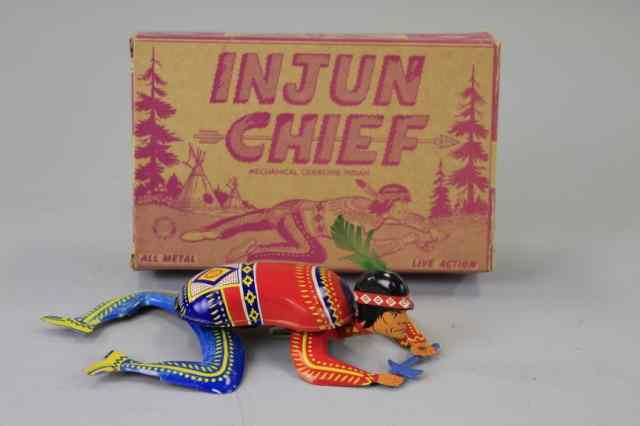 Appraisal: BOXED INDIAN CHIEF CRAWLING TOY Ohio Art lithographed tin depicts