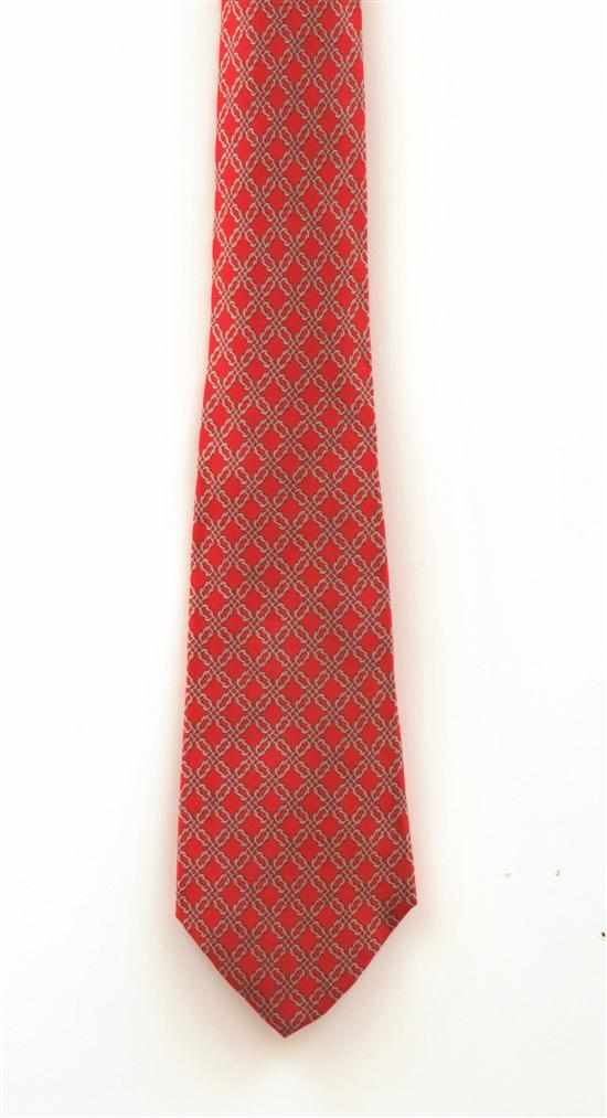 Appraisal: A SILK TIE BY HERMES The knot link design on