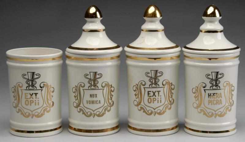 Appraisal: Lot of Gilded Porcelain Apothecary Jars Description Matching set of