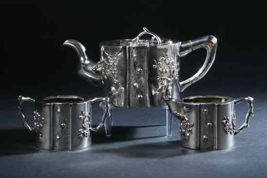 Appraisal: CHINESE SILVER THREE-PIECE TEA SET circa - marked Hong Guangji