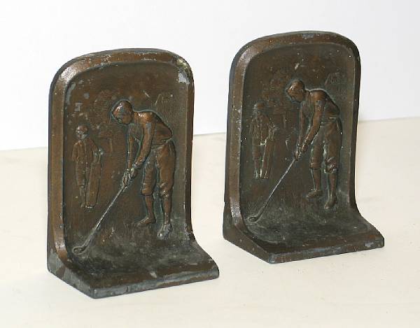 Appraisal: A pair of matching cast bronze bookends circa s featuring