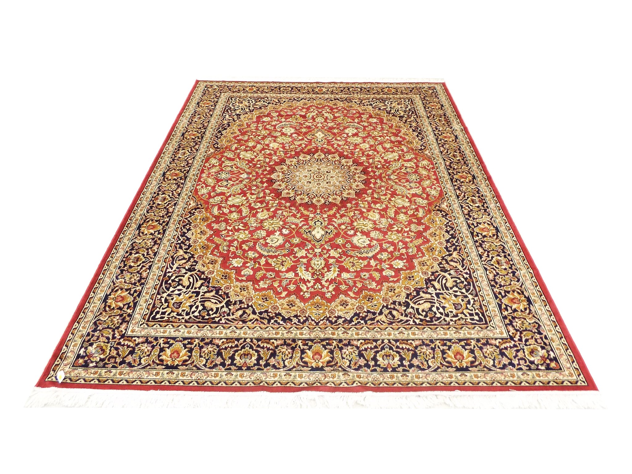 Appraisal: Keshan carpet on a red ground x