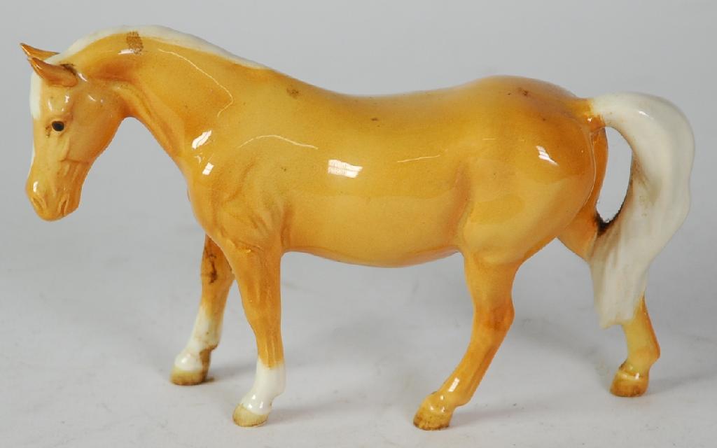 Appraisal: BESWICK POTTERY MODEL OF A PONY BOY'S PONY PALOMINO in