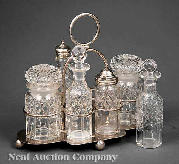 Appraisal: An Edwardian Silverplate Cruet Stand c with condiment bottles height