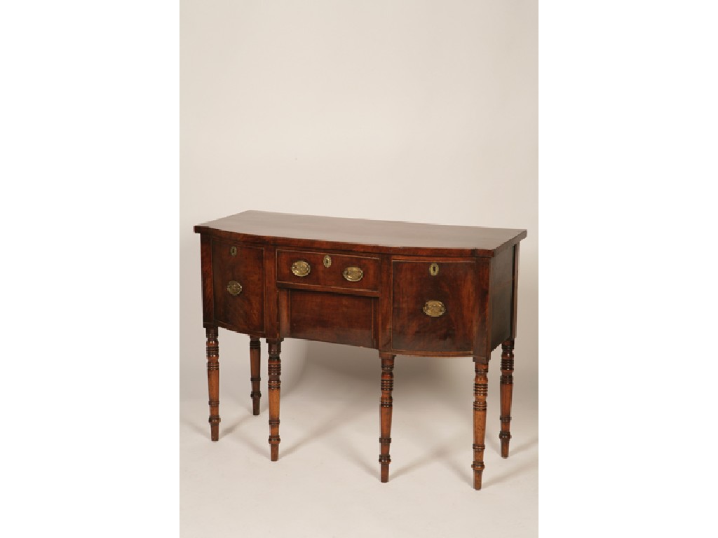 Appraisal: A GEORGE III MAHOGANY BOW FRONTED SIDEBOARD the shaped top