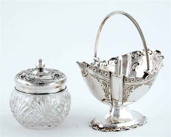 Appraisal: American sterling dresser jar and silverplate basket circa repousse-chased silver