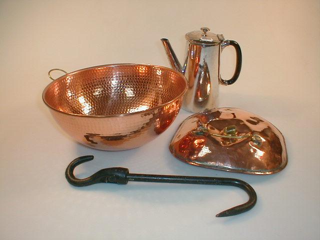 Appraisal: A thC copper stomach warmer with a brass screw stopper