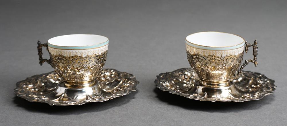 Appraisal: Pair Ottoman Empire Gilt Silver Cups and Saucers with Porcelain