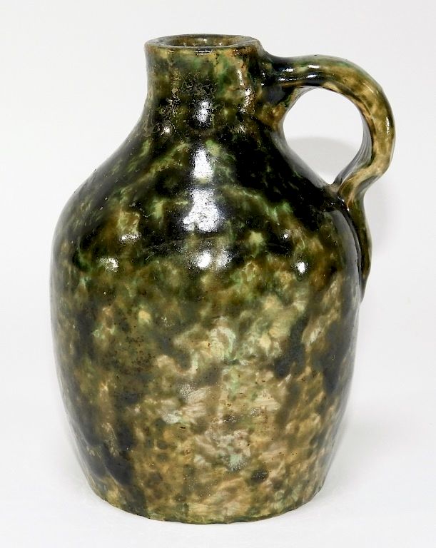 Appraisal: New England Miniature Mottled Green Stoneware Jug New England Early