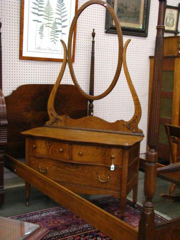 Appraisal: Golden Oak Princess Dresser with three drawers mirror frame with