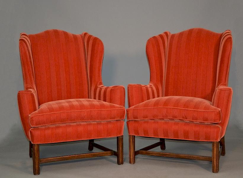 Appraisal: Pair of orange red upholstered Chippendale wing chairs Pair of