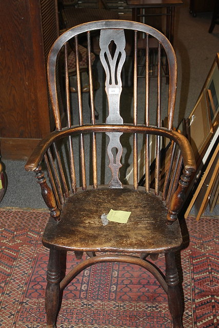 Appraisal: A TH CENTURY ELM AND ASH WINDSOR ARMCHAIR with splat