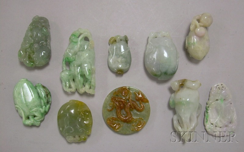 Appraisal: Ten Carved Jade Pendants and Other Items including a round