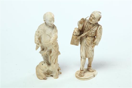 Appraisal: TWO IVORY FIGURES Japan late th-early th century Two men