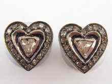 Appraisal: A pair of yellow metal tests carat gold heart shaped