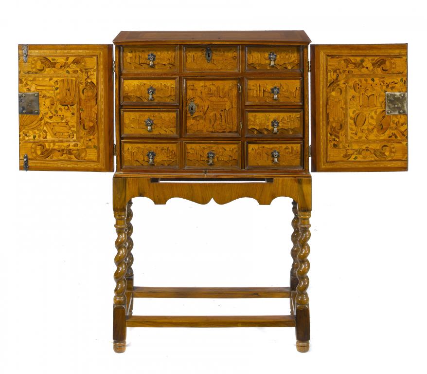 Appraisal: A WALNUT AND AUGSBURG MARQUETRY CABINET-ON-STAND the arrangement of drawers