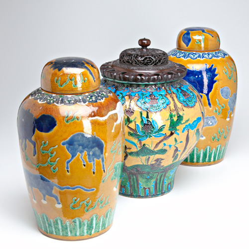 Appraisal: CHINESE CERAMICS Three large and bulbous vases with covers th-