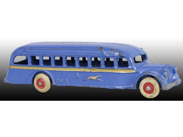 Appraisal: Cast Iron Arcade Bus Toy Description Blue with gold stripe