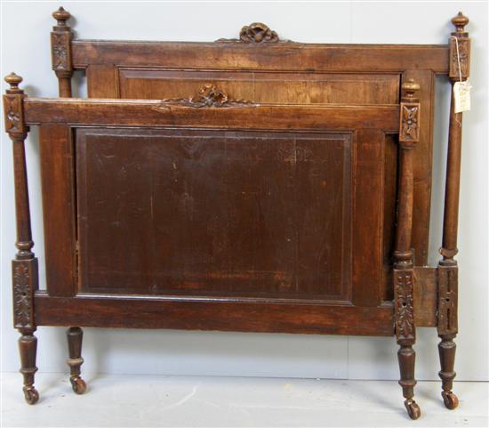 Appraisal: French carved oak single bed with panel and decoration of