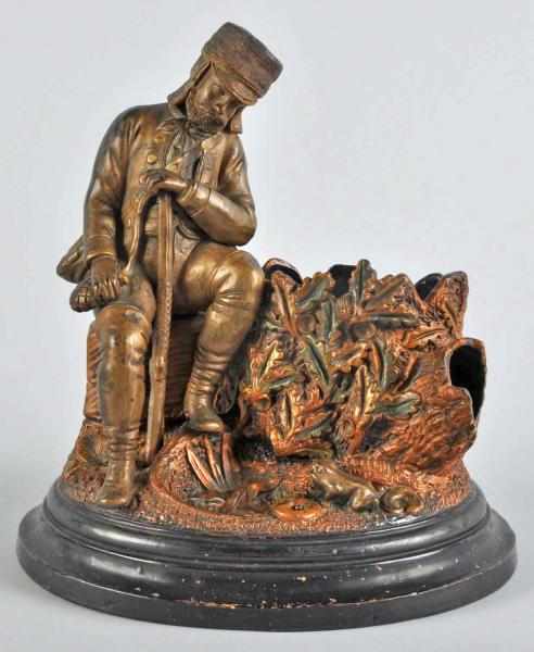 Appraisal: Figural Soldier by Tree Match Cigar Holder Description Nice image