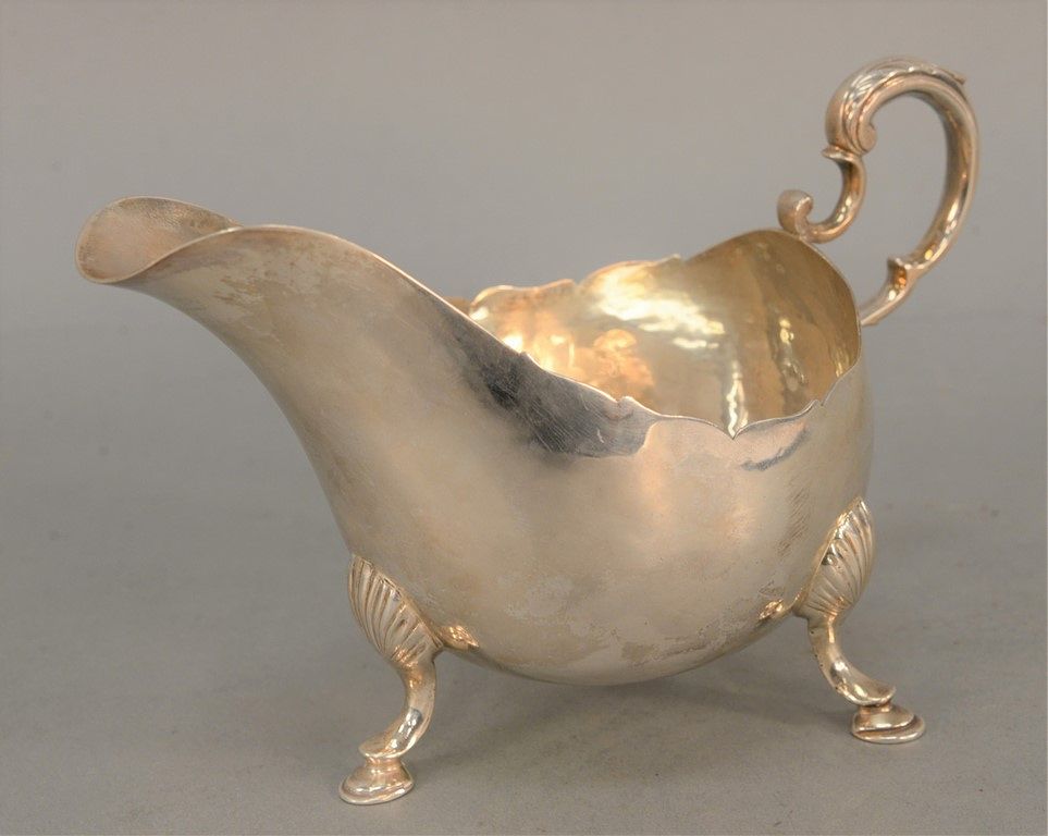 Appraisal: Irish silver sauce boat on hoof feet Dublin Matthew West