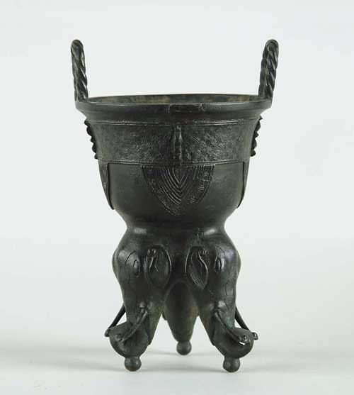 Appraisal: ORIENTAL BRONZE TRIPOD CENSER High loop rope twist style handles