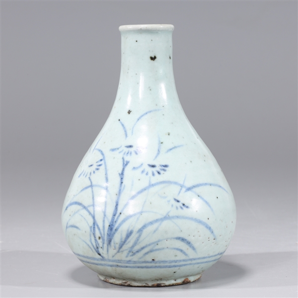 Appraisal: Korean blue and white ceramic bottle vase with floral designs