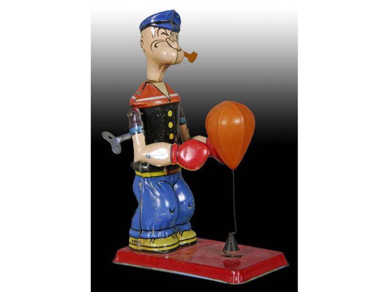 Appraisal: Popeye Chein Tin Wind-Up Floor Puncher Toy Description '' T