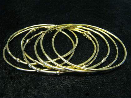 Appraisal: Group of karat yellow gold bangles bracelets IppolitaThree set with