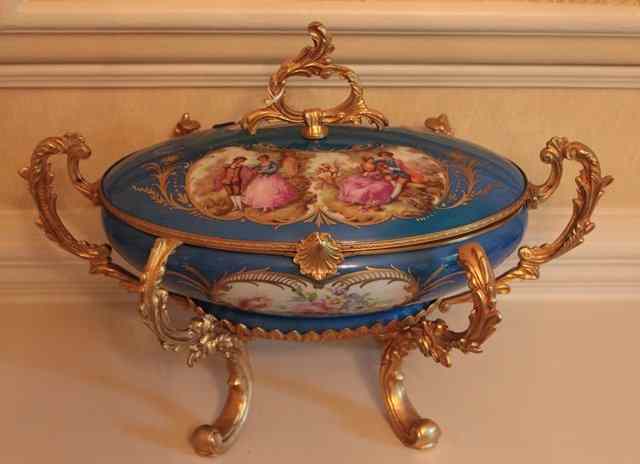 Appraisal: A FRENCH ORMOLU MOUNTED PORCELAIN OVAL BOX of light blue