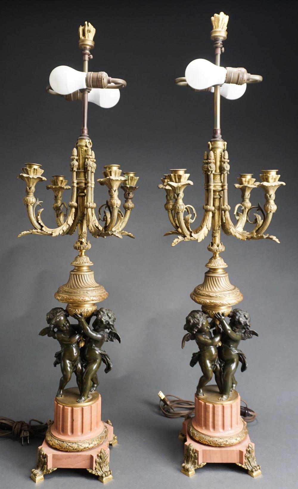 Appraisal: Pair Louis XV Style Ormolu and Bronze Putti Figural Candleabra